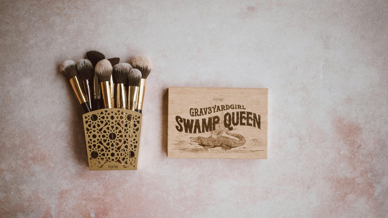 Makeup brushes, sponges, and foundation before-and-after application