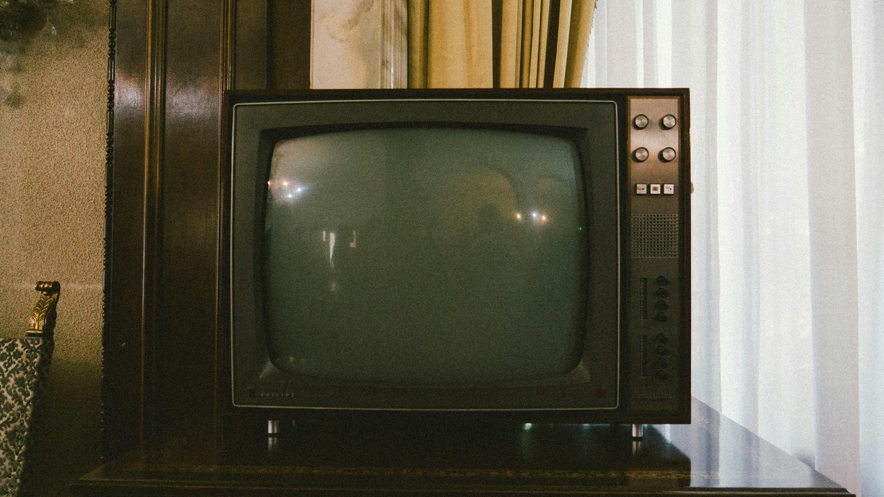 Close-up of different TV panel types: OLED and QLED screens side by side