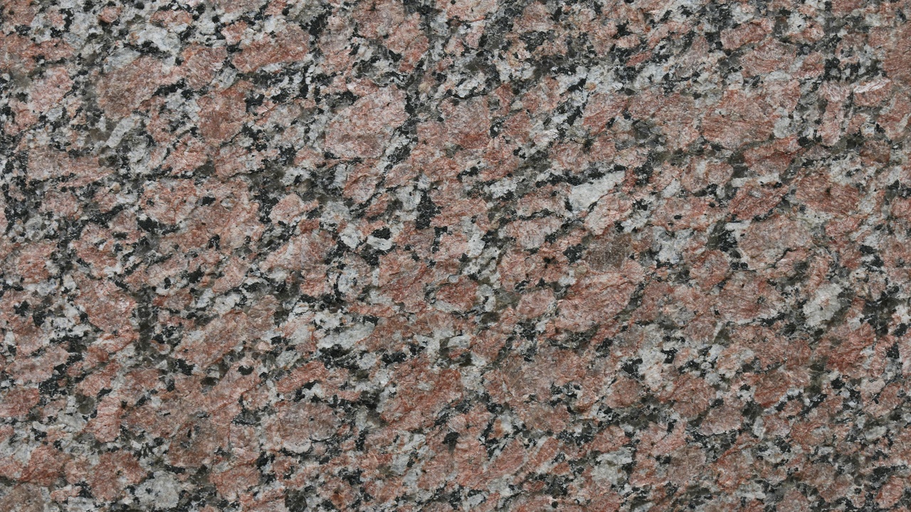 Granite countertop and layered sedimentary canyon landscape
