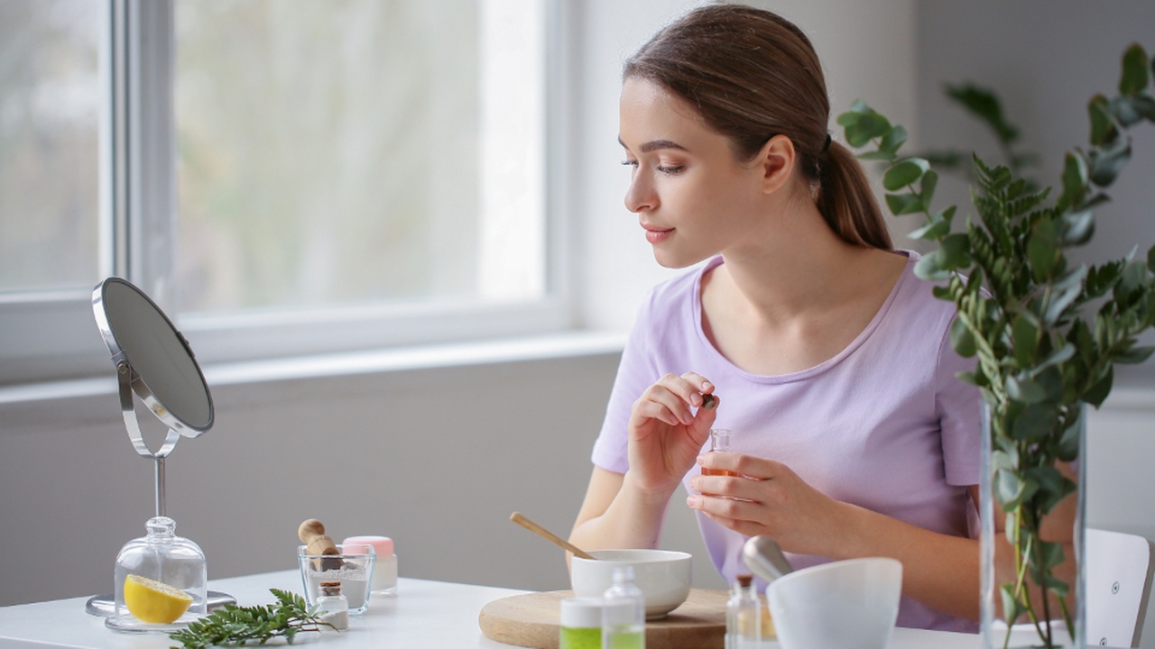 Dermatologist examining cosmetic products and skin