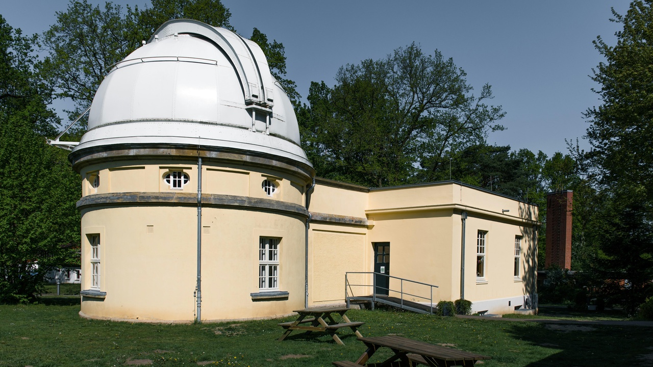 Composite of telescopes and sky surveys illustrating observational pillars like galaxy rotation and supernova surveys