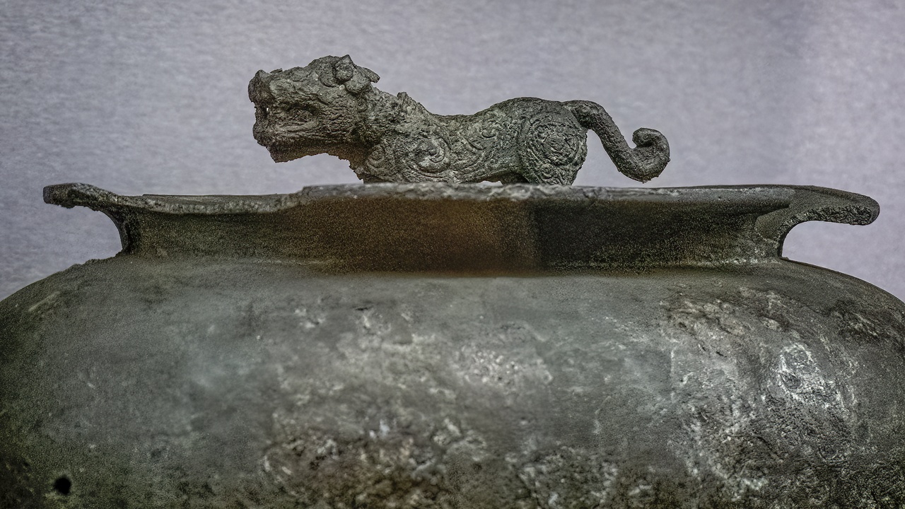 Bronze bell close-up and brass doorknob showing copper alloys