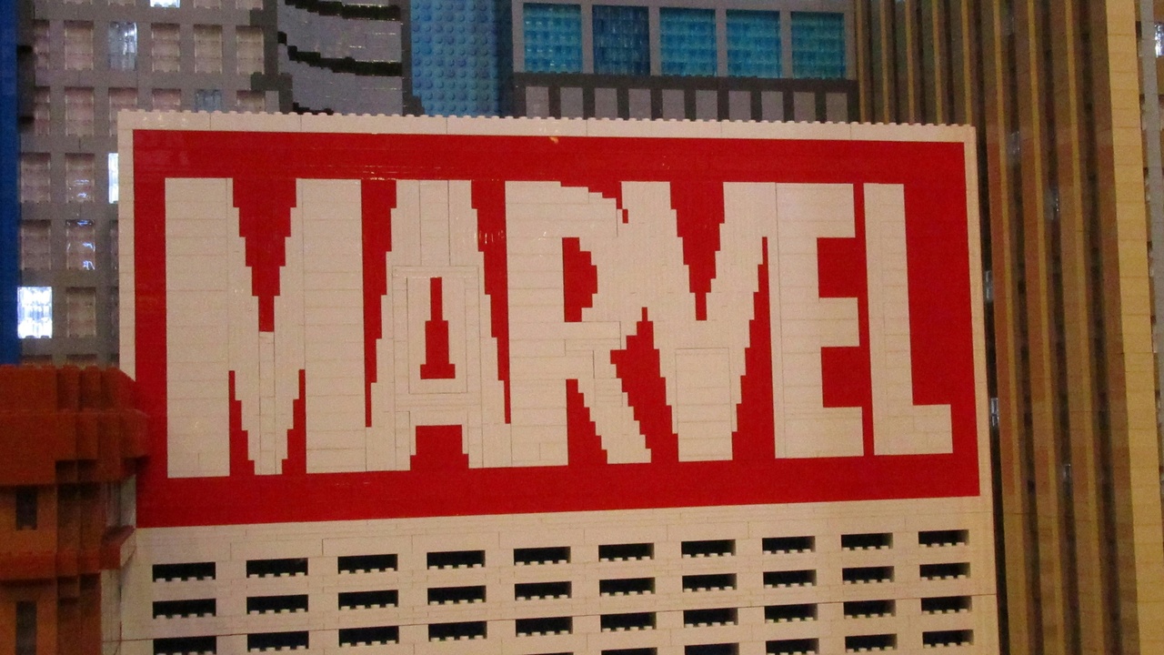 Collage of comic-book multiverse scenes and microscopic quantum branching illustrations