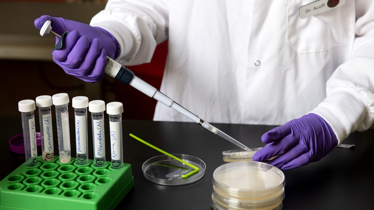 Refrigerator with labeled food and safe cooking temps chart