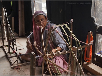 Spinning wheel (textile)