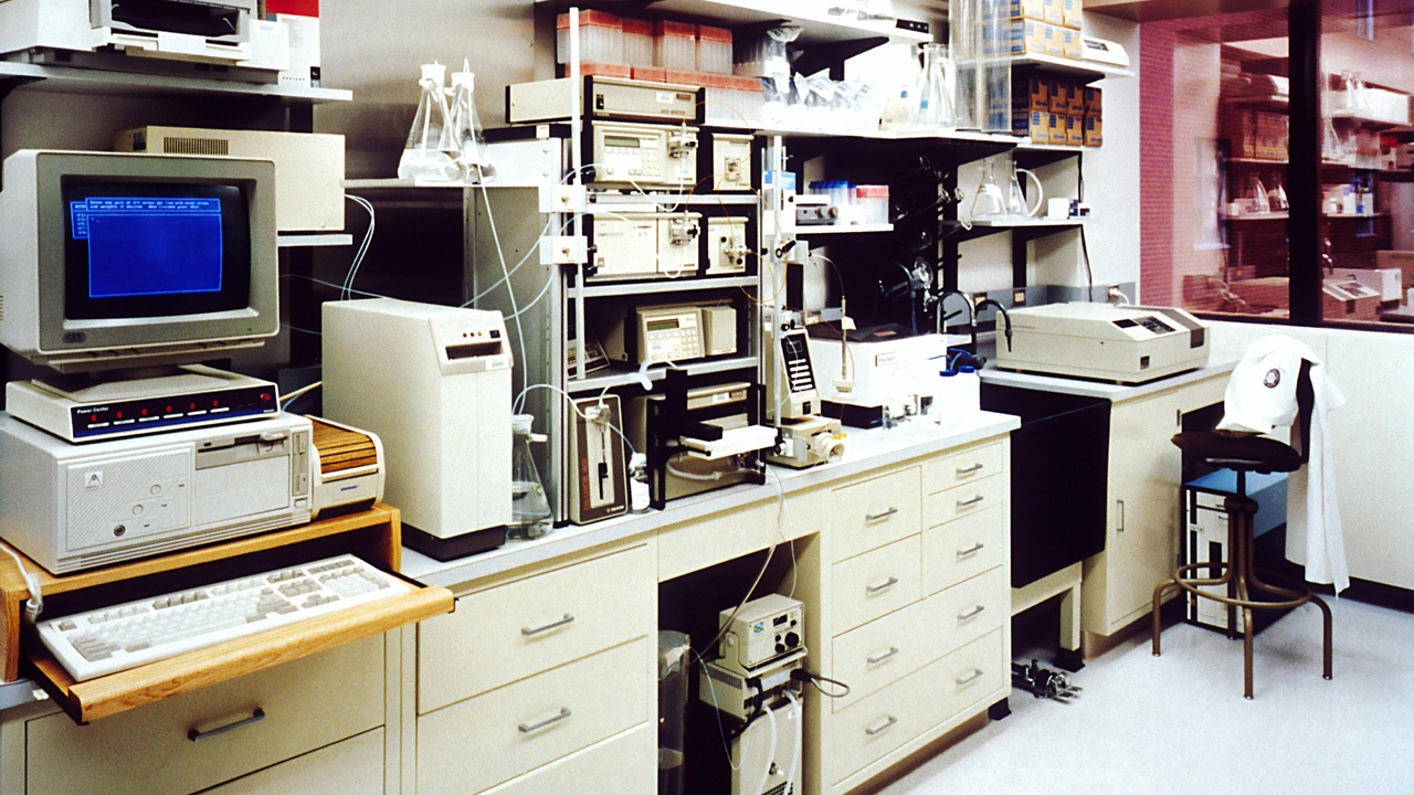 Neuroscience lab team discussing data and devices