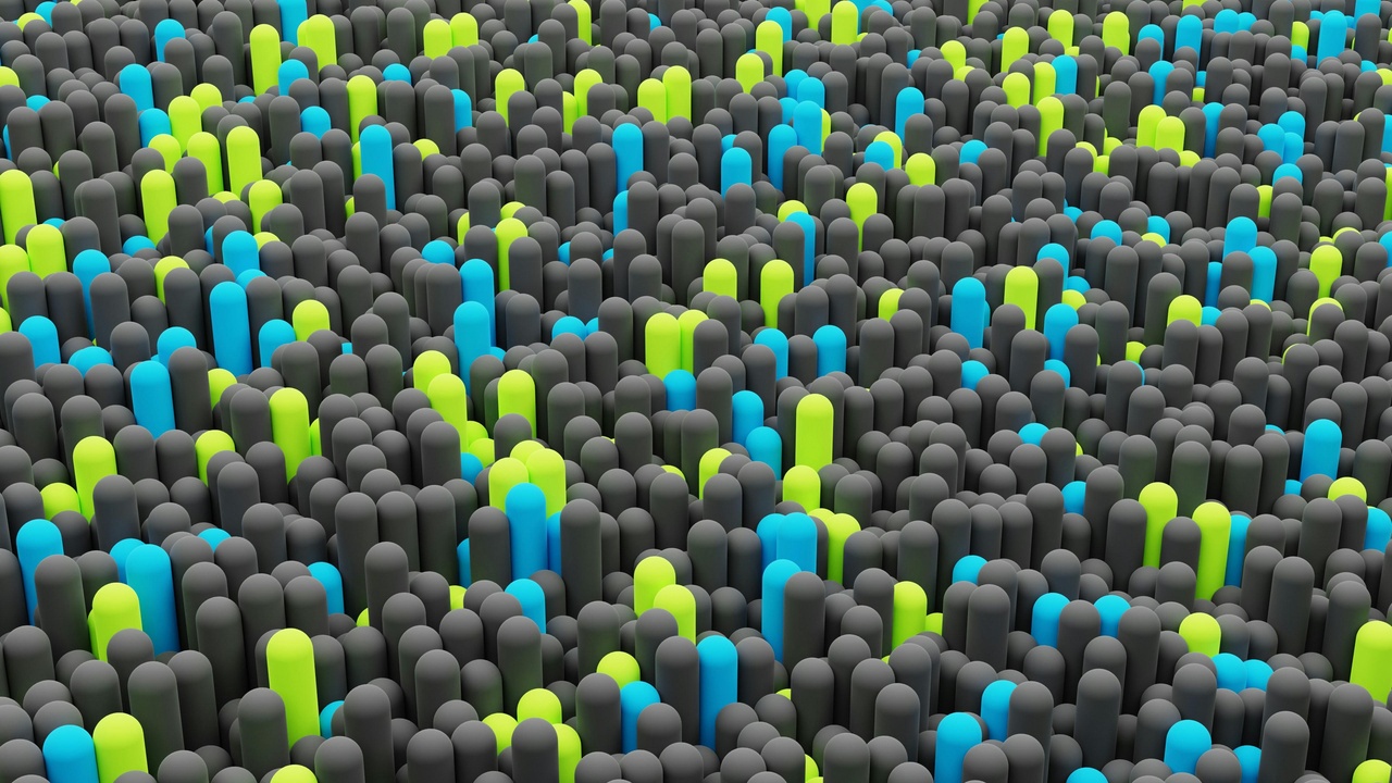 Illustration comparing atoms, nanoparticles, and a human hair to show scale