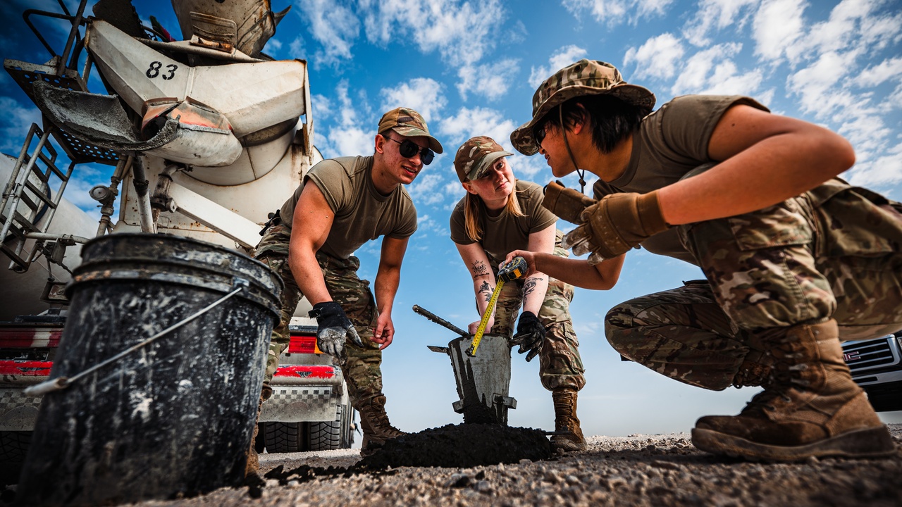 Field material testing: slump cone and density gauge being used on-site