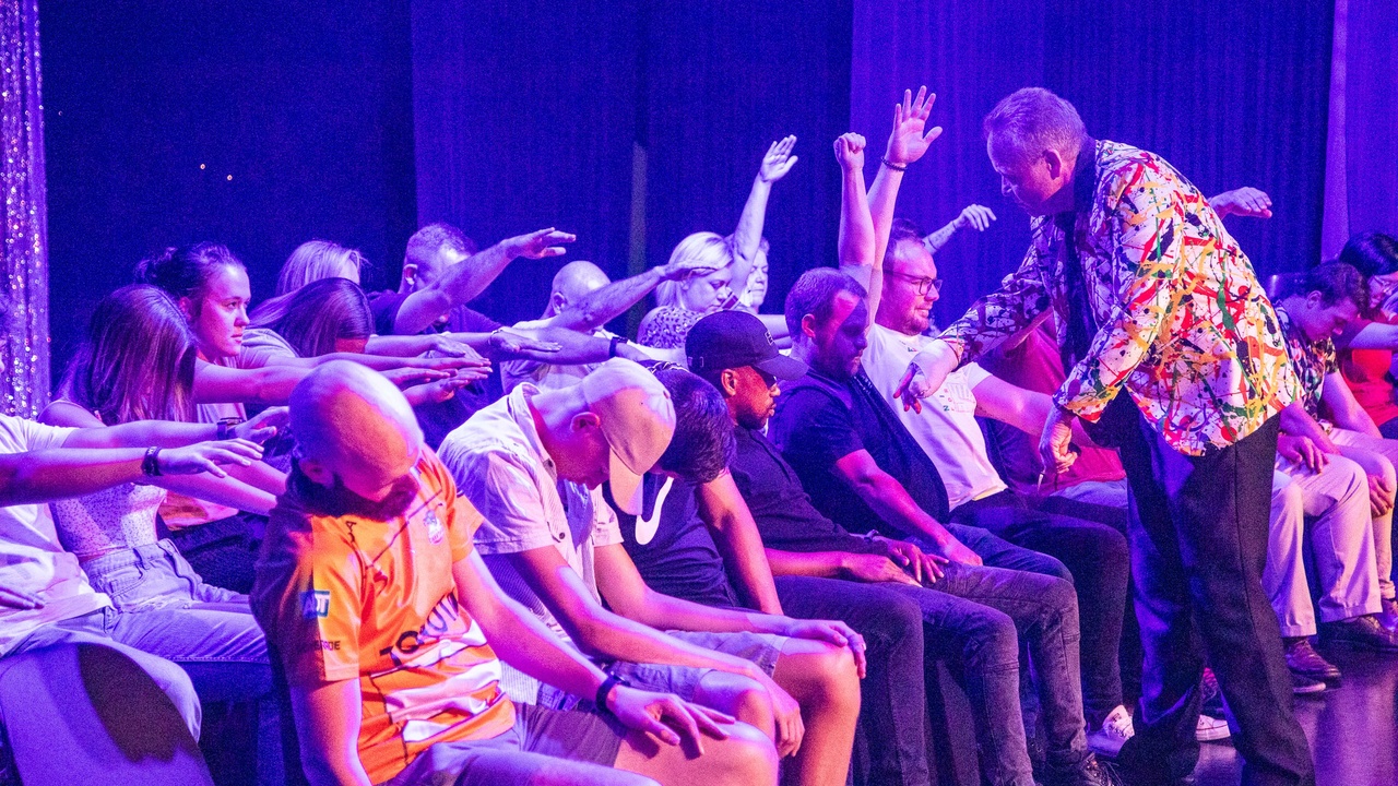 Vintage stage hypnotism poster illustrating public spectacle around hypnosis