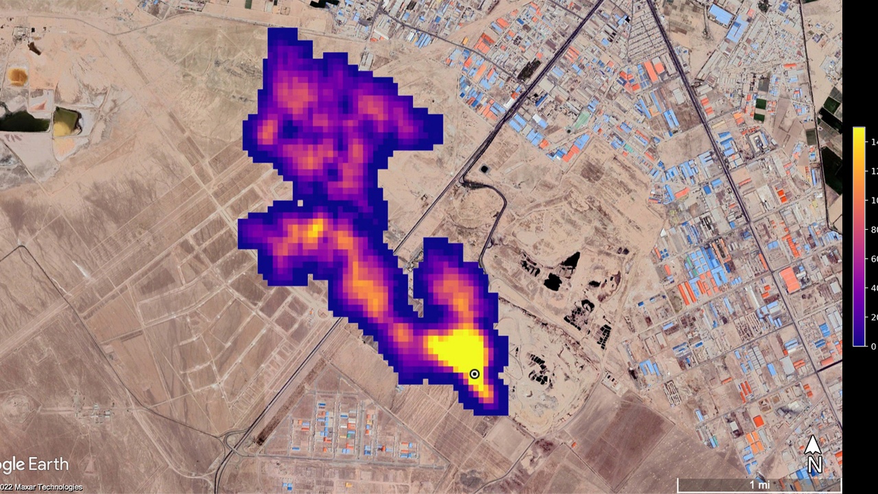 Aerial view of a landfill showing gas collection wells and waste cells