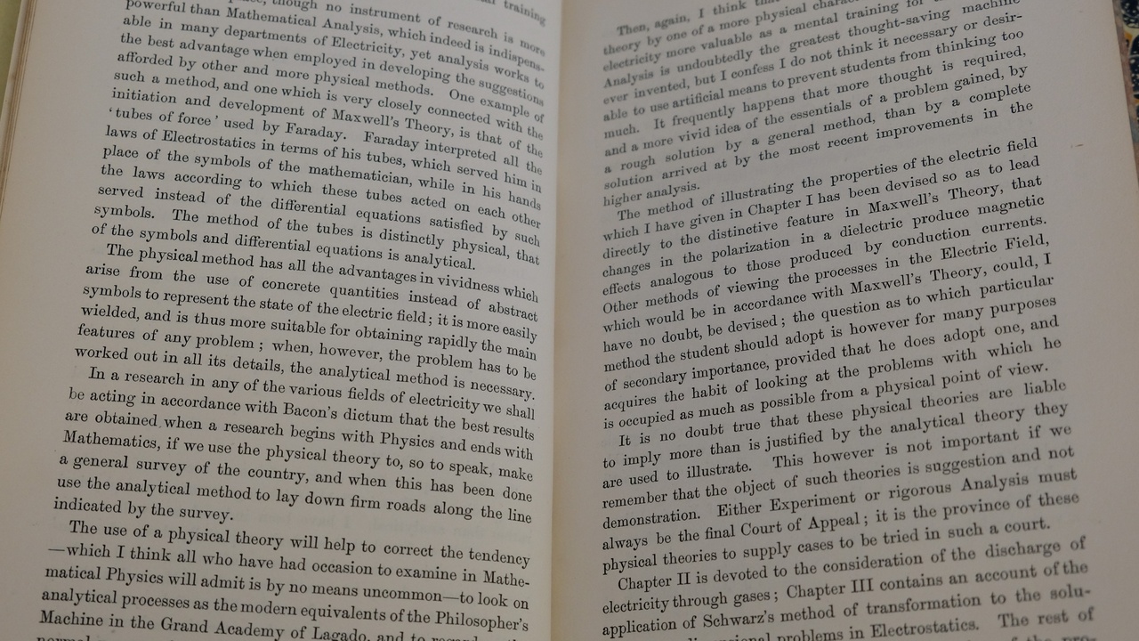 Historical illustration of early atom models and cathode ray experiment.