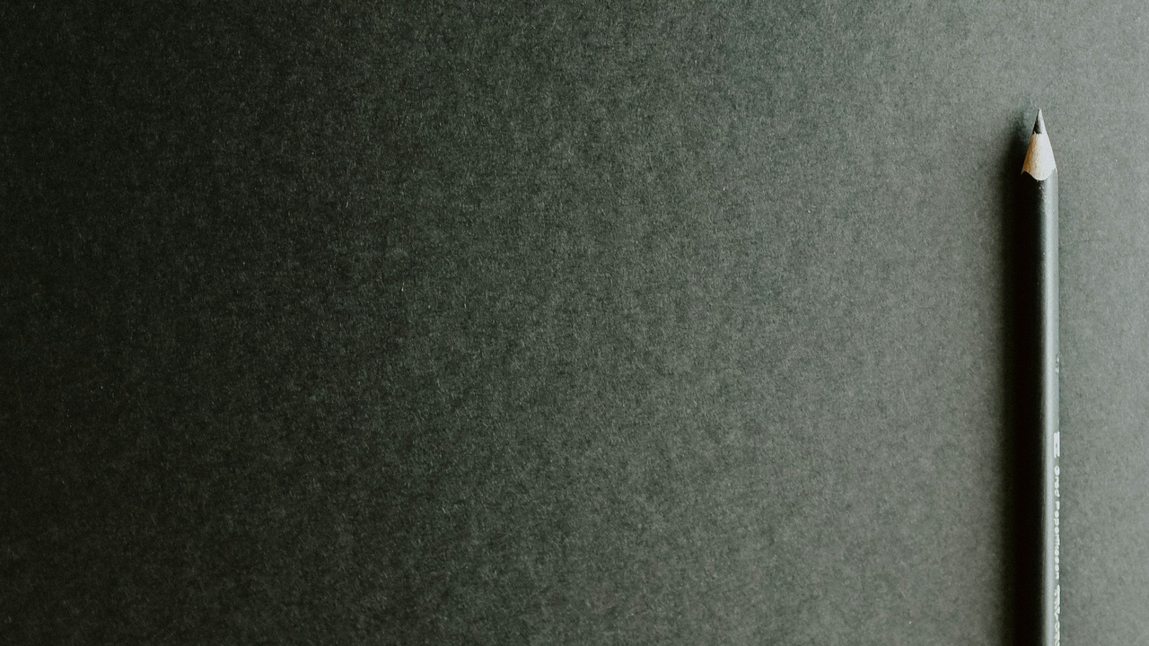 Close-up of oxidized silver surface showing a thin oxide film