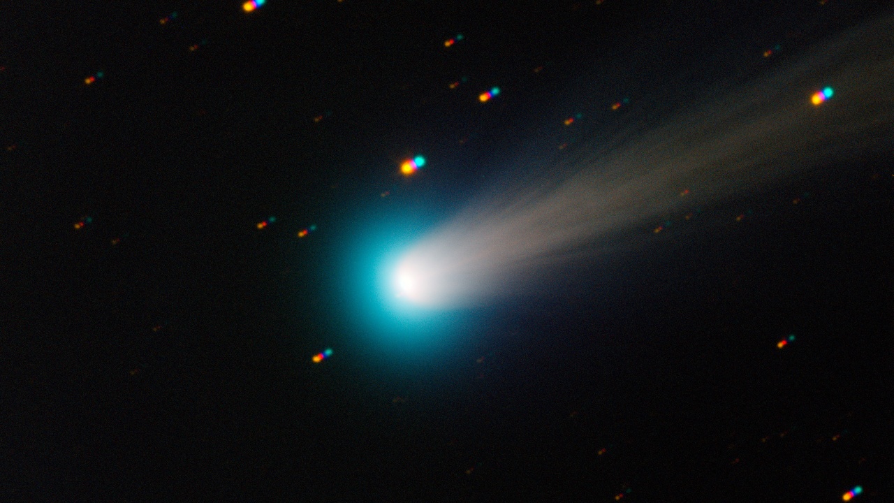 Comet nucleus with icy, dusty surface, illustrative view