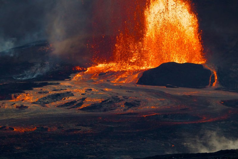Dramatic volcanic eruption with lava at Hawaii Volcanoes National Park.