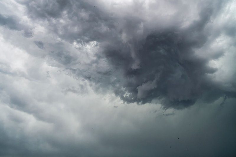 A dramatic capture of swirling storm clouds, showcasing nature's power and beauty.