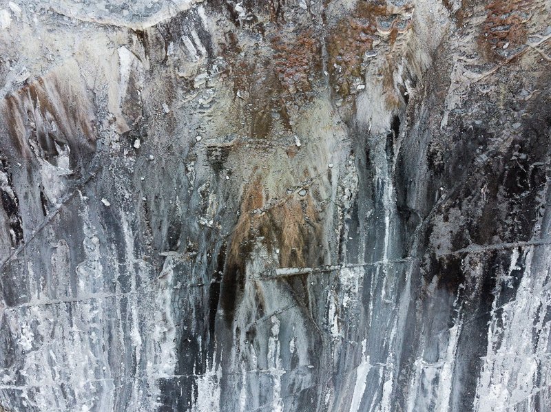 Close-up of mineral deposits at Egerszalók, Hungary, showcasing unique textures and patterns.