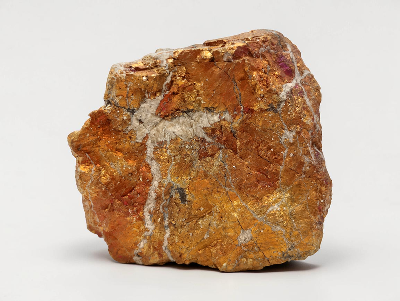 Colorful bornite mineral specimen showcasing vibrant hues from Tucson, Arizona.