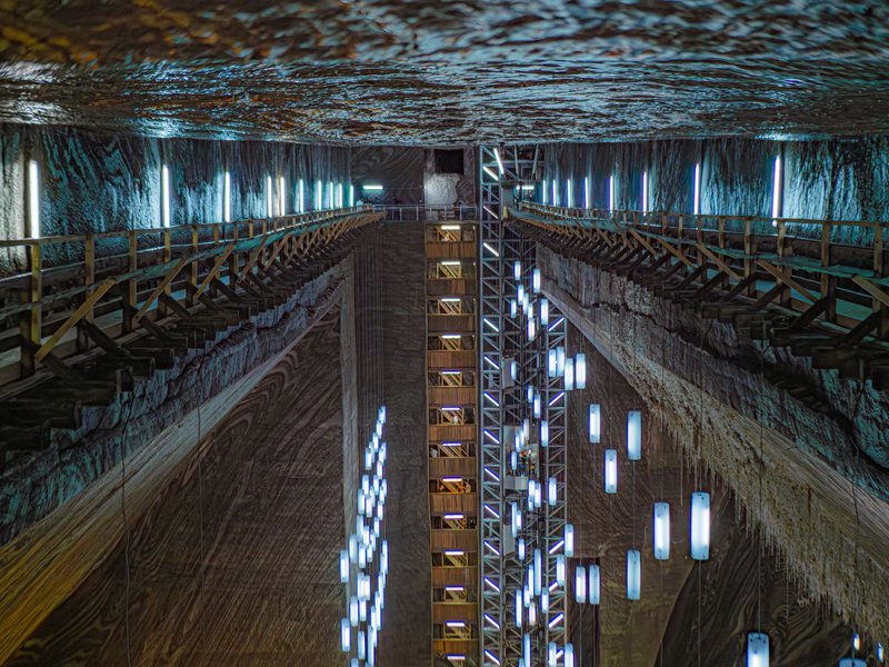 Mesmerizing interior view of Salina Turda salt mine showcasing its unique architecture.