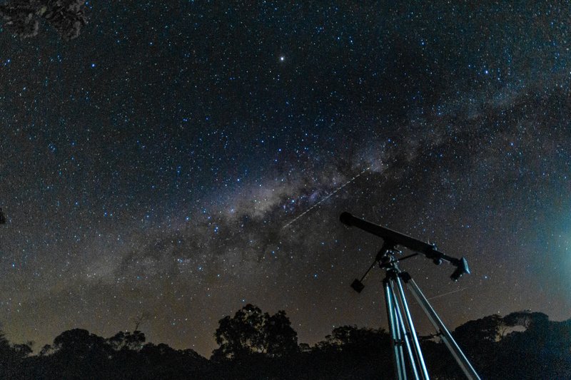 Capture of the starry sky and Milky Way with a telescope under a clear night.