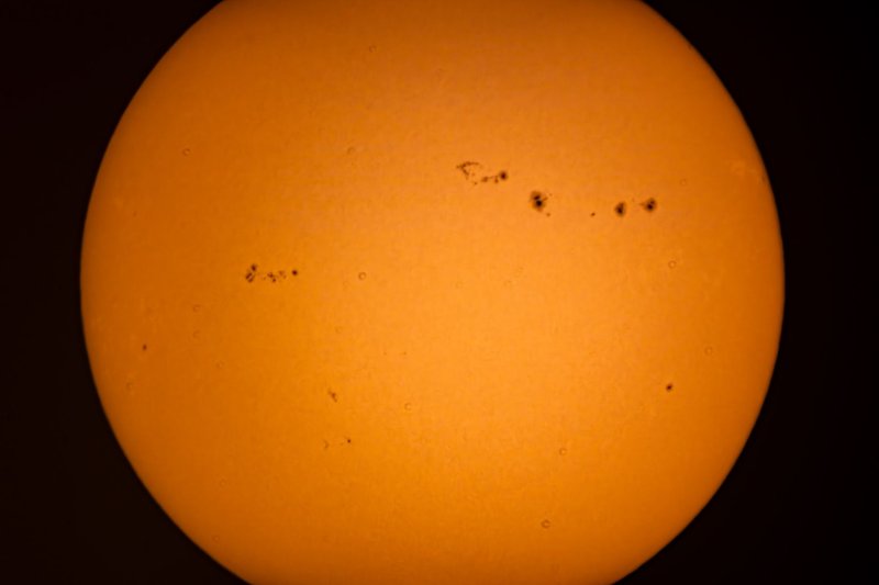 A high-resolution image capturing the Sun's surface with visible sunspots, ideal for astronomical study.
