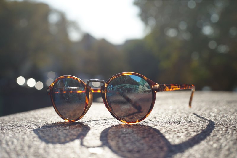 Close-up of stylish tortoiseshell sunglasses outdoors, Berlin.