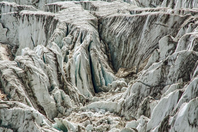 A detailed view of rugged ice crevasses and glacial formations showcasing nature's winter beauty.